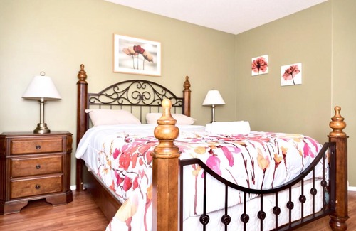 Grande Prairie Apartment | Cozy Retreat with Private Patio, 4-Star Rating & Perfect Location