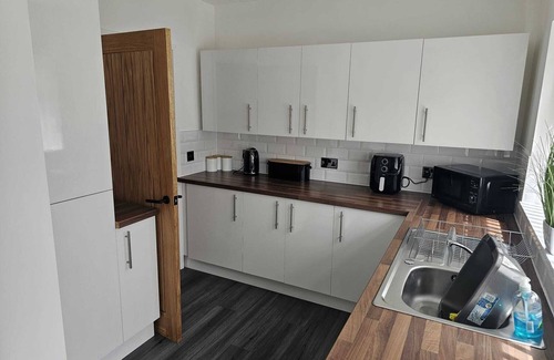 Rhyd-y-foel Cottage | Contemporary Retreat Steps from Castle & Town Attractions