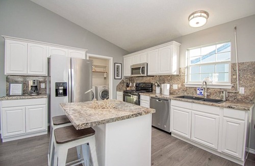 Pirates Beach House | Family-Friendly Retreat Steps from the Beach with Spa Access