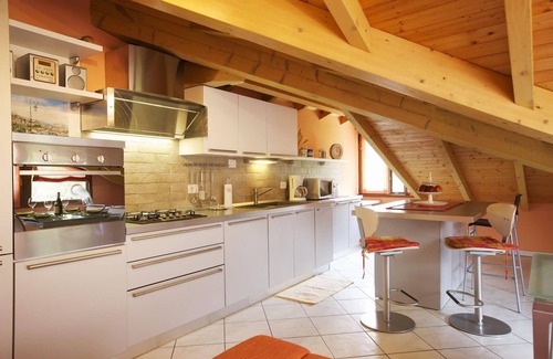 Cannobio Apartment | Inviting 3-Room Attic Apartment with Garden & Scenic Views