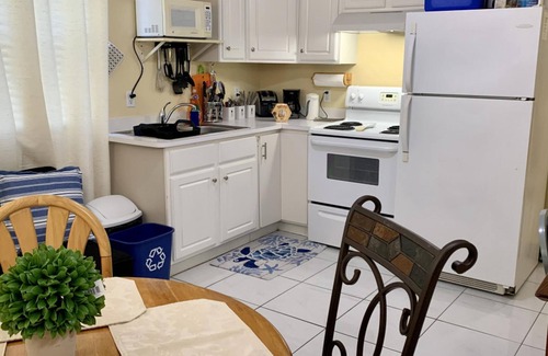 West Bay Apartment | Relax at BP Beach Concierge: Island Retro Chic Getaway