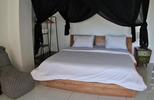 Dompu Hotel | Oceanfront Bliss at 3 Waves Hotel with Private Beach Access