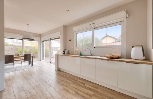 Lanton House | Modern Retreat with Pool Steps from the Beach