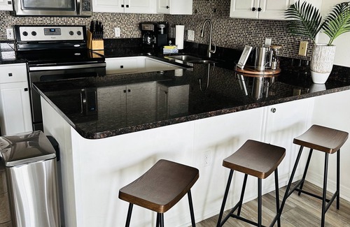 Gulf Place Apartment | Prime Gulf View Retreat: Steps to Beach & Top Amenities