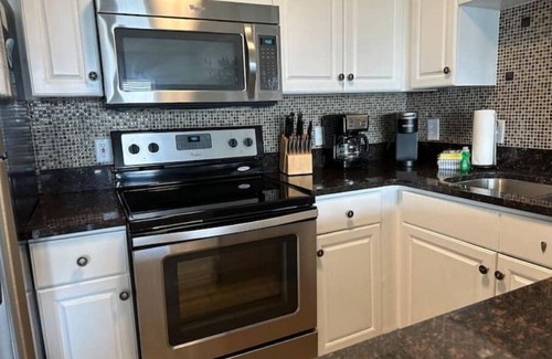 Gulf Place Apartment | Prime Gulf View Retreat: Steps to Beach & Top Amenities