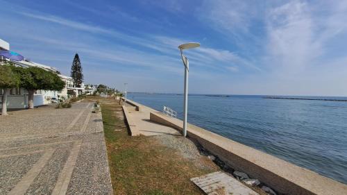 Oroklini Apartment | Relaxing Oceanfront Apartment with Private Beach Access