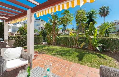 San Pedro de Alcantara Apartment | Beachfront Garden Apartment with Top-Rated Amenities