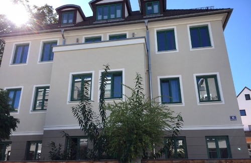 Regensburg Apartment | Scenic Garden View Apartment with Breakfast and Family Amenities