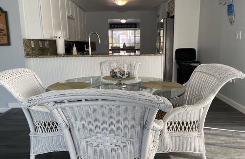 Yacht Club House | Elegant 3BR Canal Retreat with Heated Pool & Ocean Views