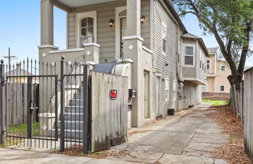 Faubourg Delassize House | Cozy 3BD Home Steps to Saint Charles with Gated Parking