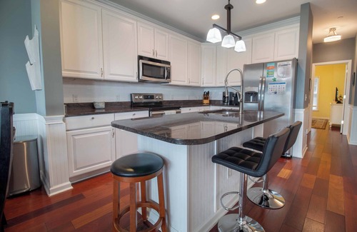 Waters Edge Condo | Riverfront Haven: 3BR Pool & Dock Access, Perfect for Families