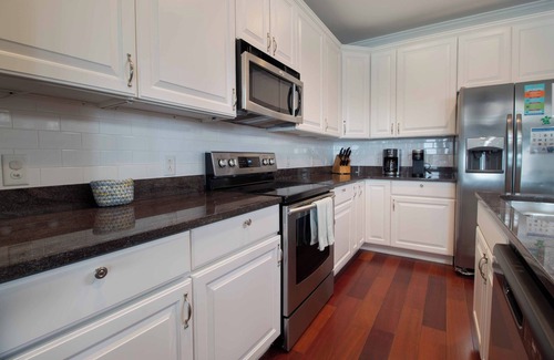 Waters Edge Condo | Riverfront Haven: 3BR Pool & Dock Access, Perfect for Families