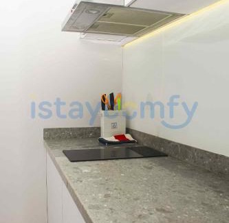 Lubuk Baja Apartment | Family-Friendly 3BR Aston Residence with City and Sea Views