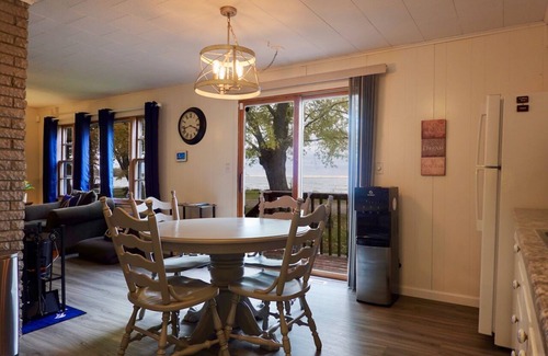 Isle Cabin | Lakefront 3BR Cabin with Beach, Boat Dock & Spa Amenities