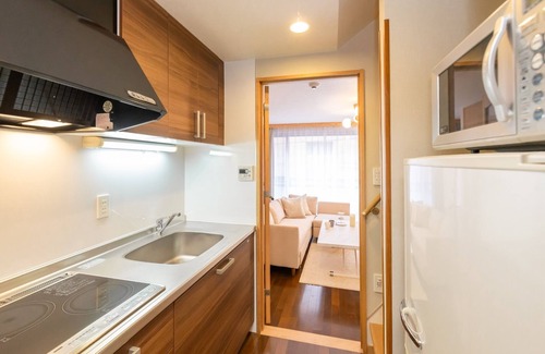 Shinsekai House | Relax in Tsutenkaku Royal House with Rooftop Dining