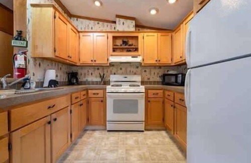 Neillsville Cabin | Experience Riviera Pub and Grill Just Steps from Your Cabin