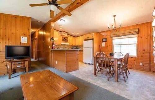 Neillsville Cabin | Experience Riviera Pub and Grill Just Steps from Your Cabin