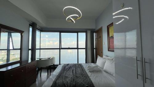 Ermita Apartment | 3BR Grand Riviera Suites by MrSayla