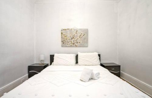 West New York Apartment | Bright 3BR Skyline Apartment in Vibrant District - Pet Friendly
