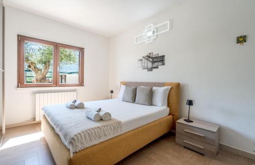 S'Iscala Apartment | 3min dalla Spiaggia, Elegante Villetta a Budoni