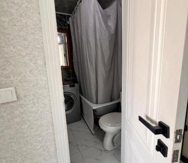 Aktau Apartment | Pet-Friendly Retreat in 4 микрорайон for Families