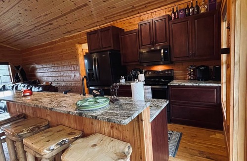 Wolf Creek Cabin | Family-Friendly Cabin at Holter Lake with Pool & Fishing!