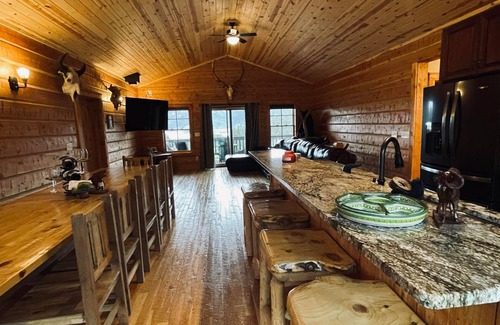 Wolf Creek Cabin | Family-Friendly Cabin at Holter Lake with Pool & Fishing!