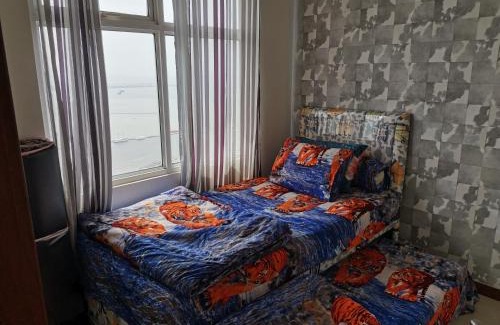 Pluit Apartment | Family-Friendly 4 Bed Condo with Pool by The Sea
