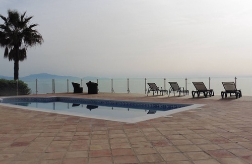 Manilva Villa | Breathtaking 4-Bed Villa with Oceanfront Views in Sotogrande