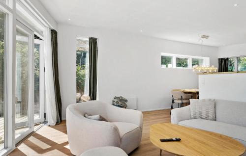 Hvidbjerg Strand House | Beachfront 4-Bedroom Home in Brkop with Ocean Views