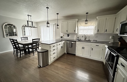 Raymore House | Family-Friendly 4 Bedroom House Near Dining and Shopping