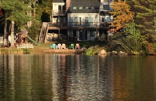 Gray House | Lakefront Retreat: 4BR Poolside Escape for 12 Guests