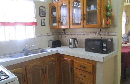 Port of Spain House | Comfortable 4BR/3BA Home with Kitchen and Family Amenities