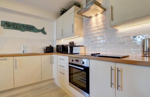 Hele Apartment | Gold Award-Winning Suite with Ocean Views and Garden Access