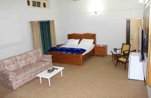 Balakot House | Private 2-Bedroom Guest House with Lawn & Pet-Friendly Amenities