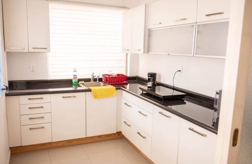 Torreon Apartment | Cozy Master Suite for Two with Breakfast & Kitchen Access