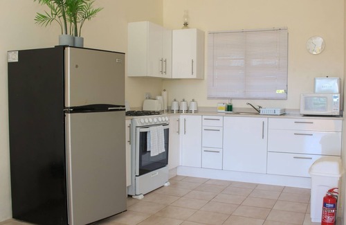 Runaway Bay House | Beachside Bliss: 2BR Retreat with Ocean Views & Family Perks