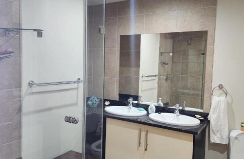 Durban Point Apartment | 403 Point Bay: Oceanfront Oasis with Unmatched Guest Ratings
