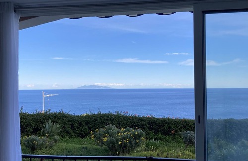 Figarella Apartment | Garden Level Retreat with Panoramic Sea Views & Kitchen