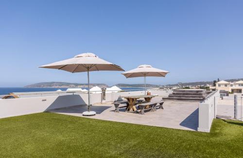 Robberg Beach Villa | Oceanfront Villa 41 on Beachy Head with Pool & Hot Tub