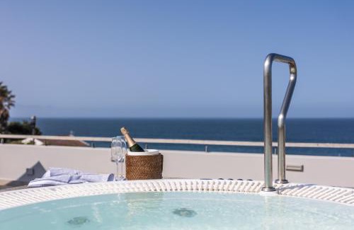Robberg Beach Villa | Oceanfront Villa 41 on Beachy Head with Pool & Hot Tub