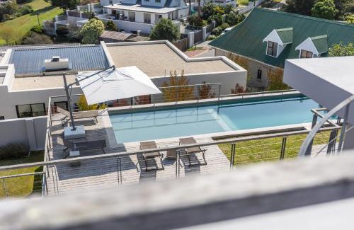 Robberg Beach Villa | Oceanfront Villa 41 on Beachy Head with Pool & Hot Tub