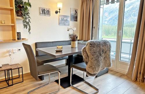 Champfer Apartment | Scenic Alpenschick Retreat with Pool and Ocean View