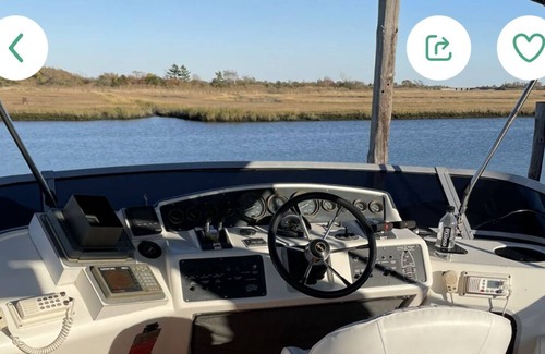 Freeport's Nautical Mile Boat Rental | 45 foot yacht with heat! 2 bedroom apartment inside with 2 TVs and full kitchen.