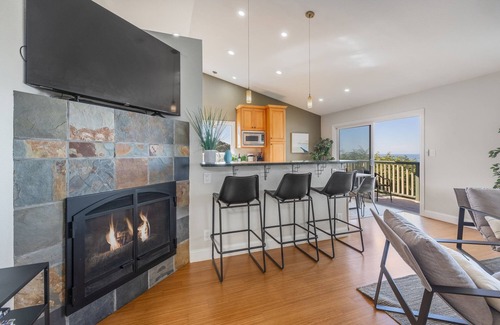 Edgemar - Pacific Manor House | Discover a 4BR Ocean-View Oasis with Hot Tub & Arcade