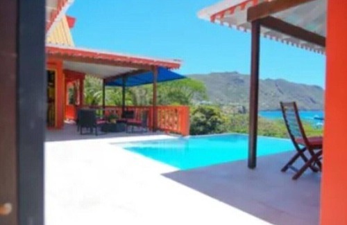 Mount Pleasant Villa | Experience Flamingo Villa: Oceanfront Retreat with Pool