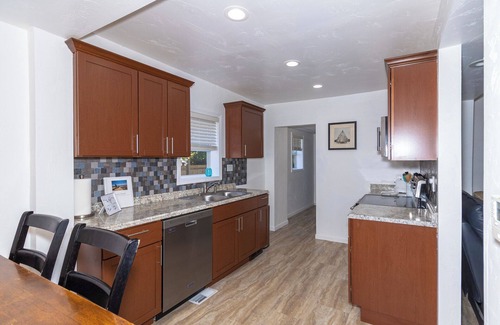 Two Rivers House | Unforgettable Stay Near Lake Michigan Beach with Arcade Room