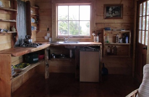 Waiotahi Cabin | Unique Off-Grid Timber Cabin with Panoramic Ocean Views