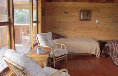 Waiotahi Cabin | Unique Off-Grid Timber Cabin with Panoramic Ocean Views