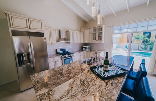Opal Villa | Top-Rated 5-Bedroom Villa Steps from Ritz and Palm Beach